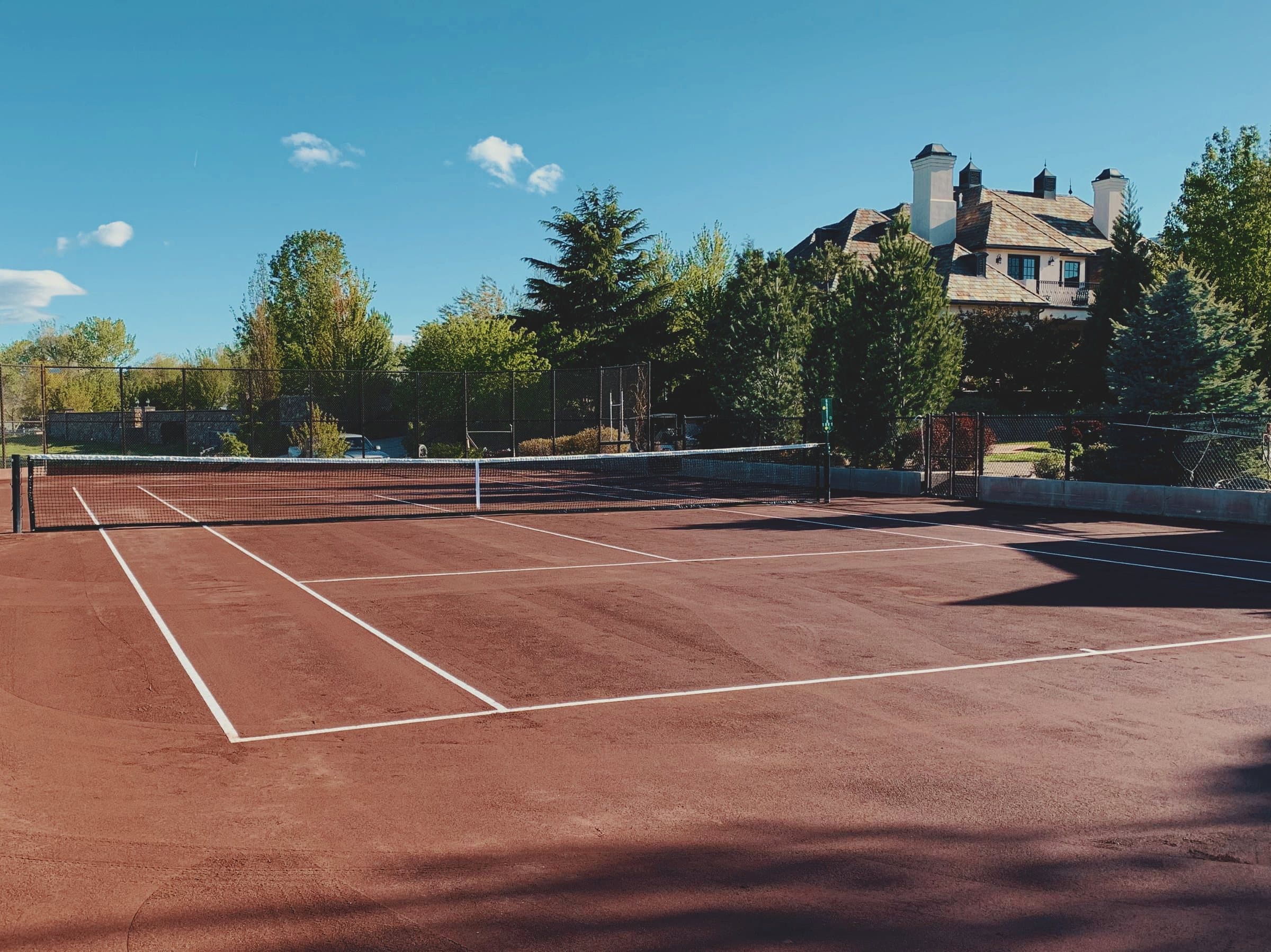 Red clay court at a private estate